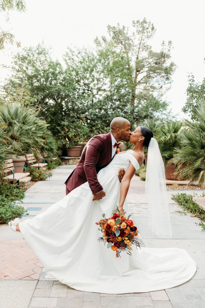 cute picture of the newly married couple kissing