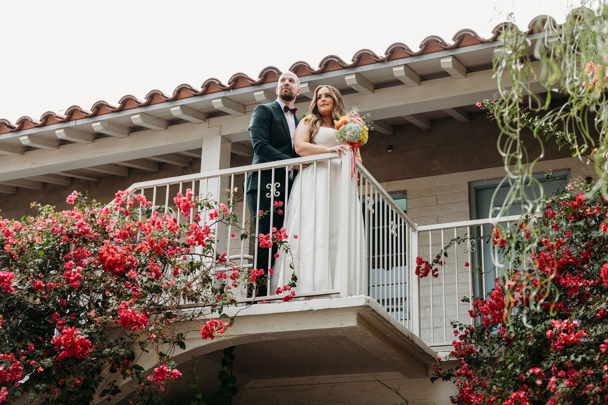 Bride and groom, hugging during their photoshoot