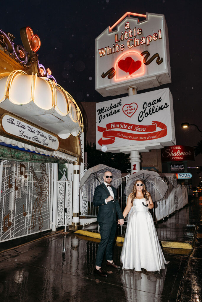 Picture of the newlyweds holding hands