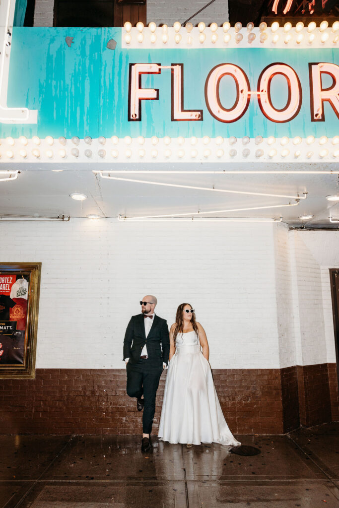 Picture of the newly married couple holding hands