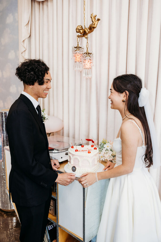Couple cutting their vow renewal cake