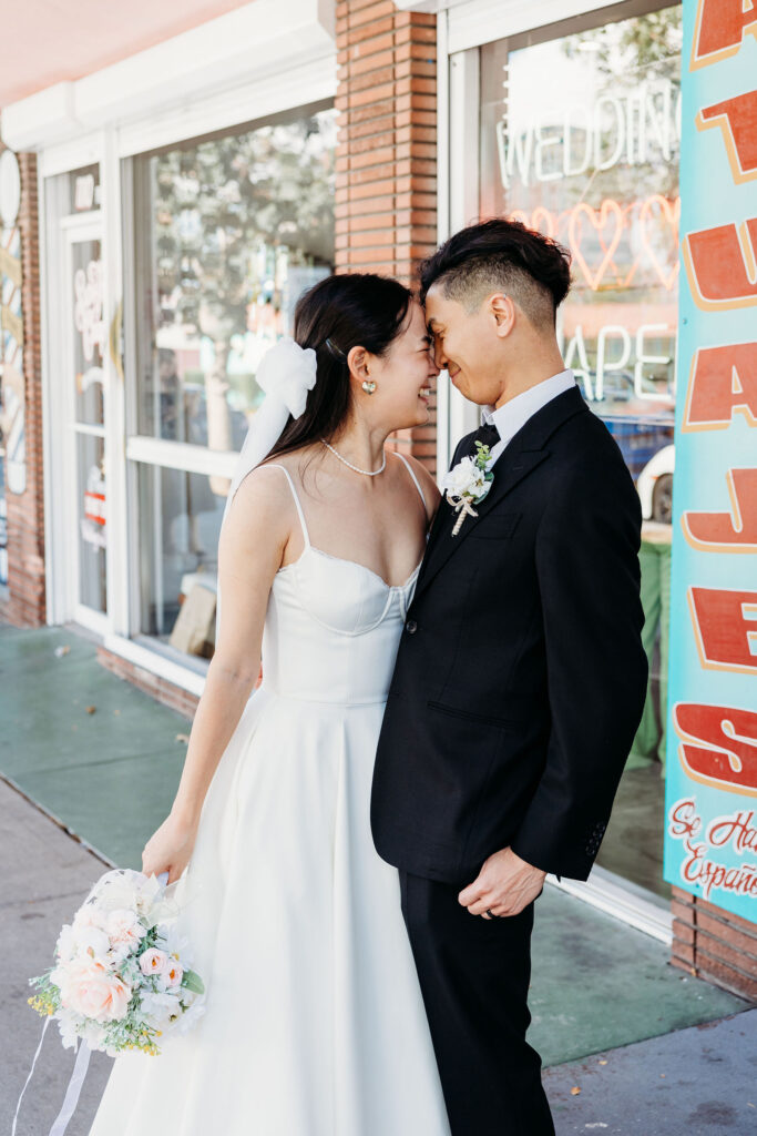 cute picture of the couple smiling at each other