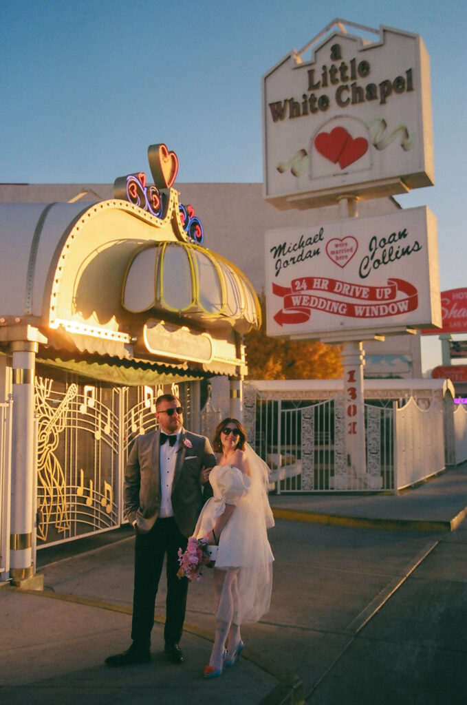 beautiful picture of the newlyweds holding hands