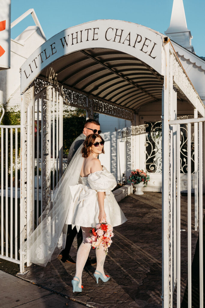 cute picture of the bride and groom holding hands