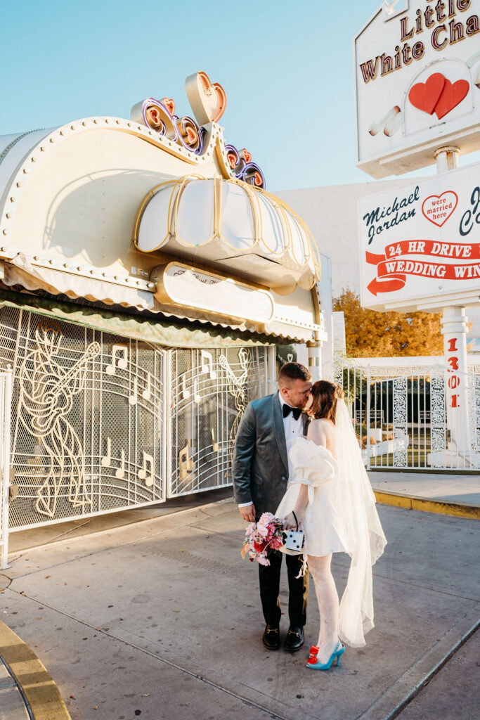 cute picture of the newlyweds kissing