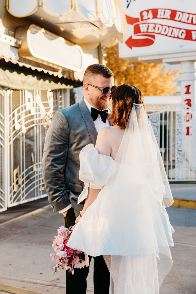 cute picture of the newlyweds smiling at each other