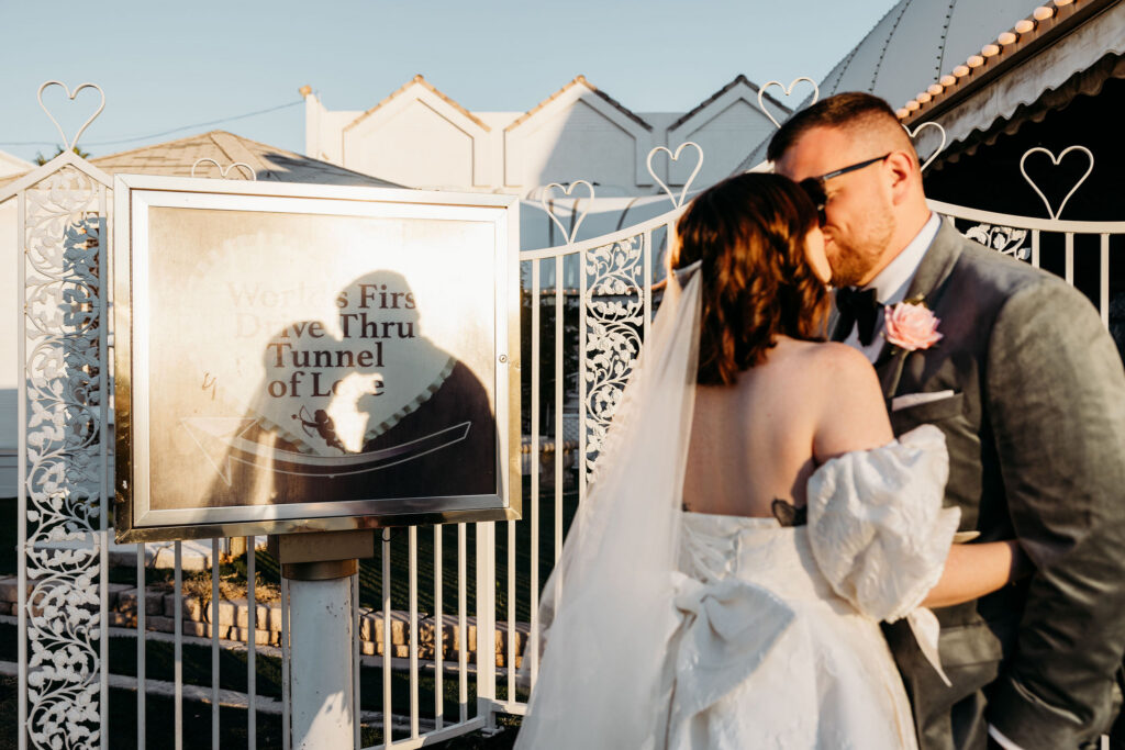 cute portrait of the newlyweds kissing