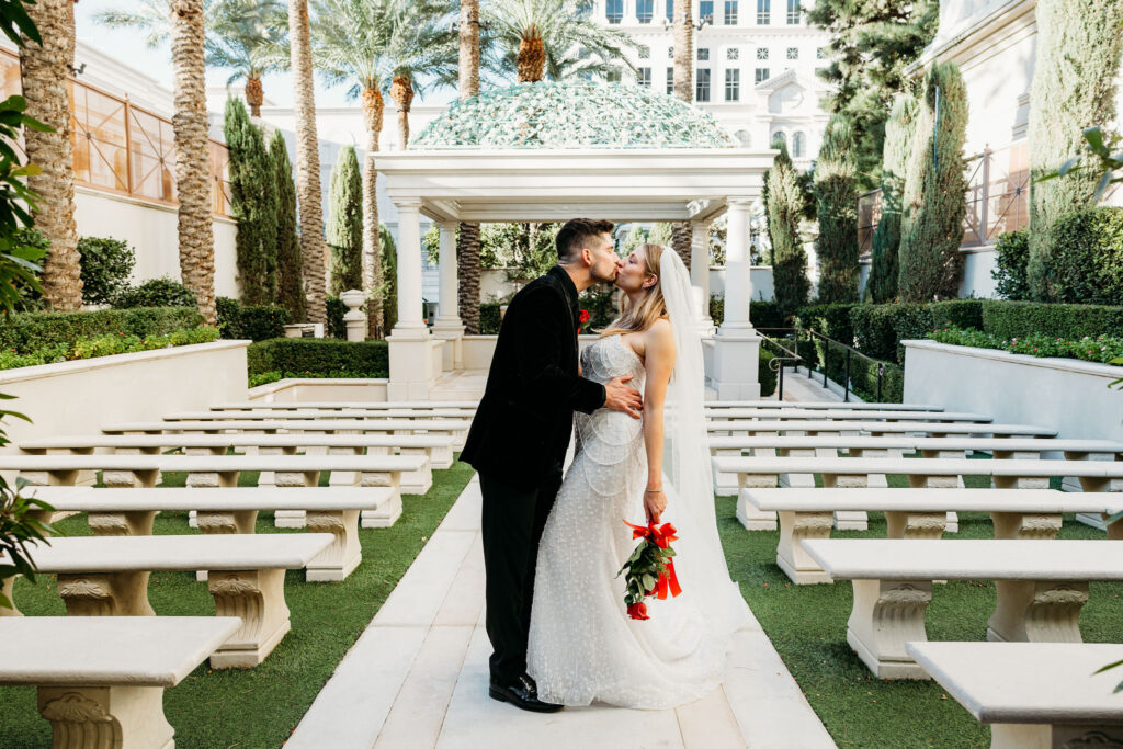 Portrait of the newlyweds, kissing