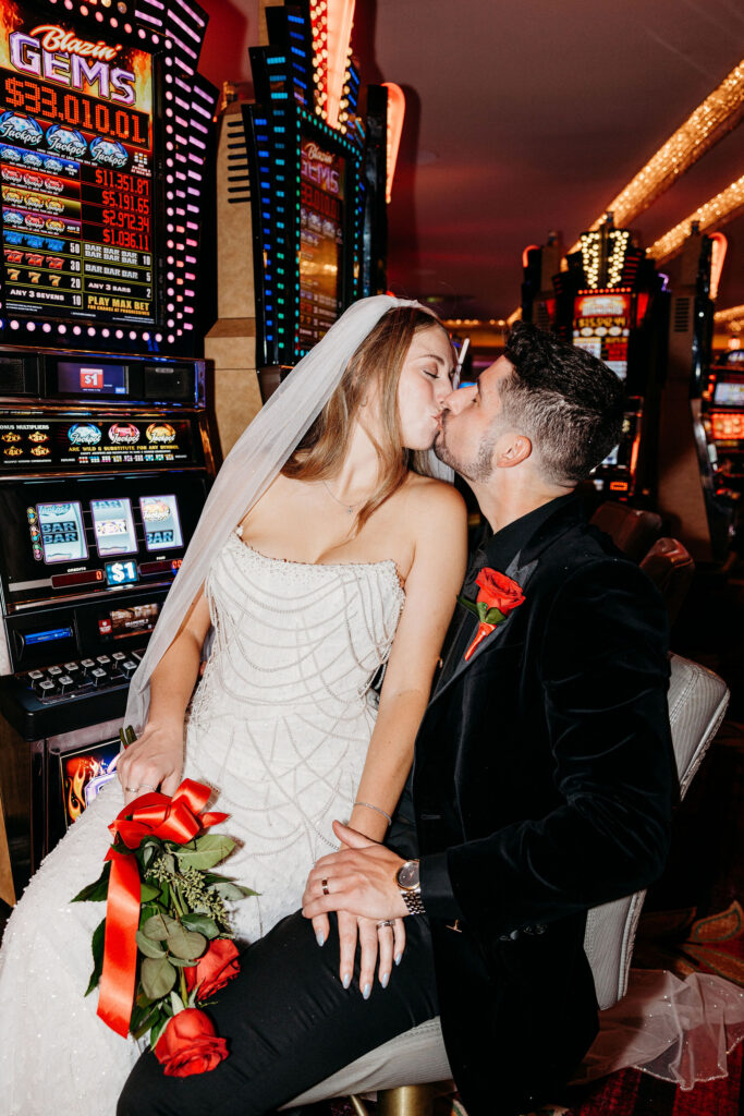 Portrait of the newly married couple kissing