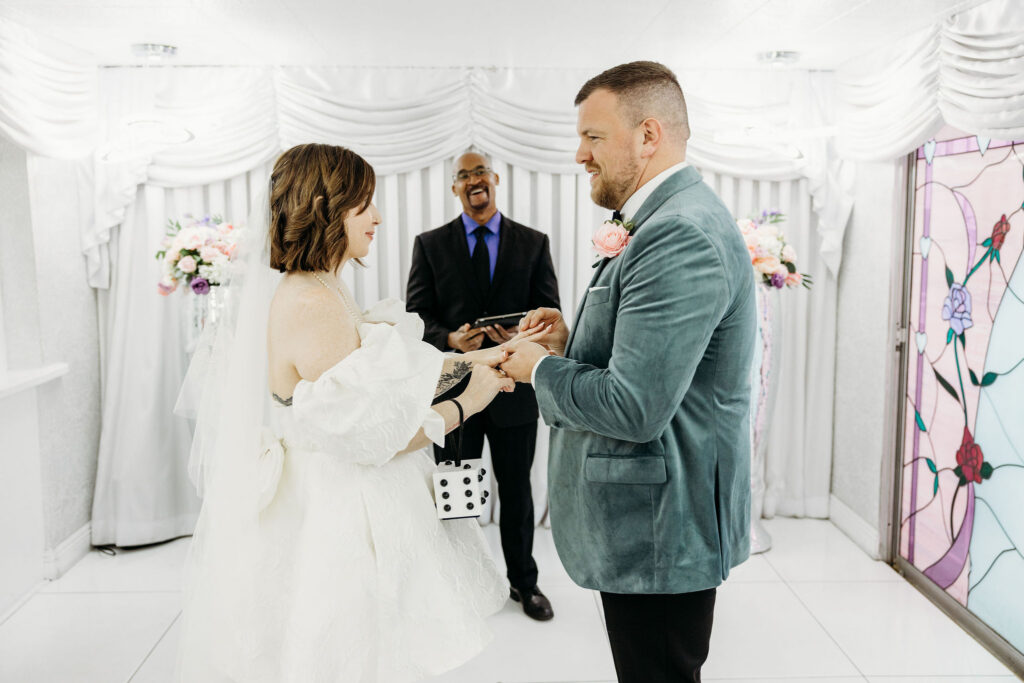 bride and groom holding hands during their ceremony