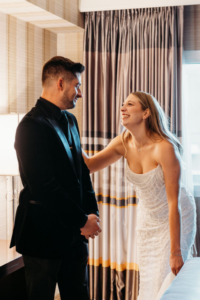 Groom emotional, seeing the bride in her wedding dress