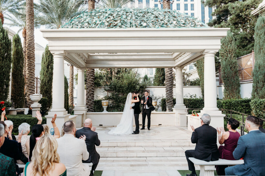 couple kissing after their wedding ceremony