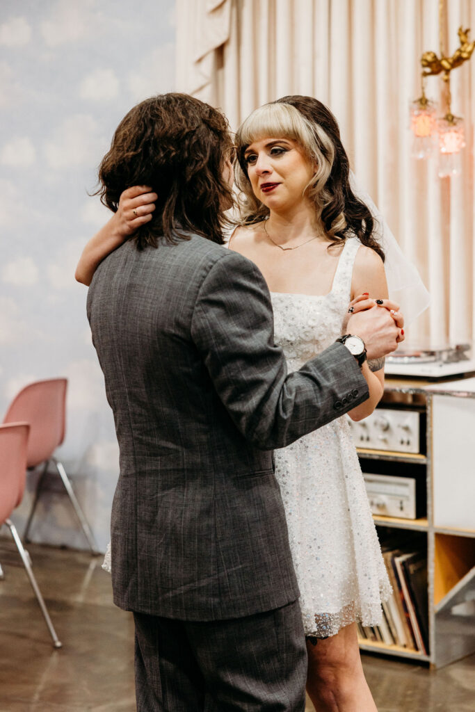 Newly married couple dancing after their ceremony