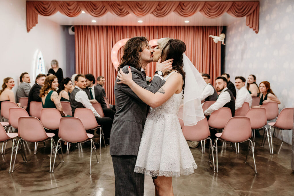 Cute picture of the newly married couple kissing