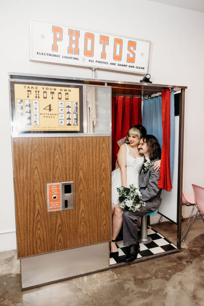 Picture of the newly married couple smiling at each other