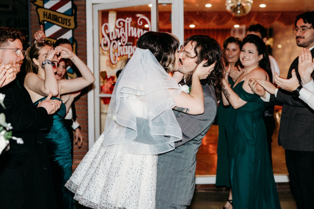 Cute picture of the newly married couple kissing