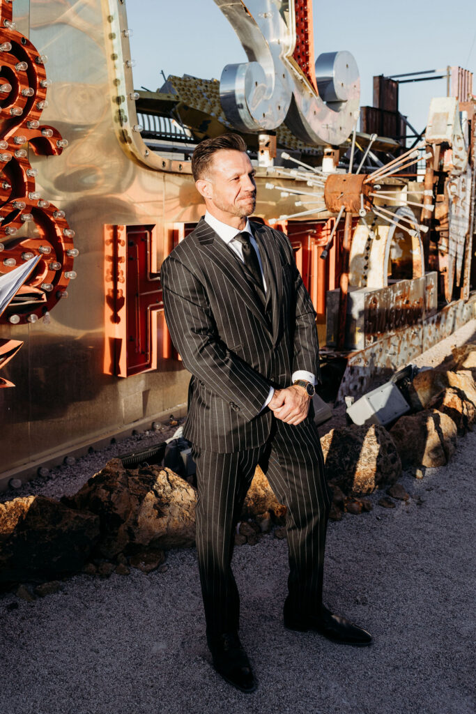 groom watching the bride walk down the aisle