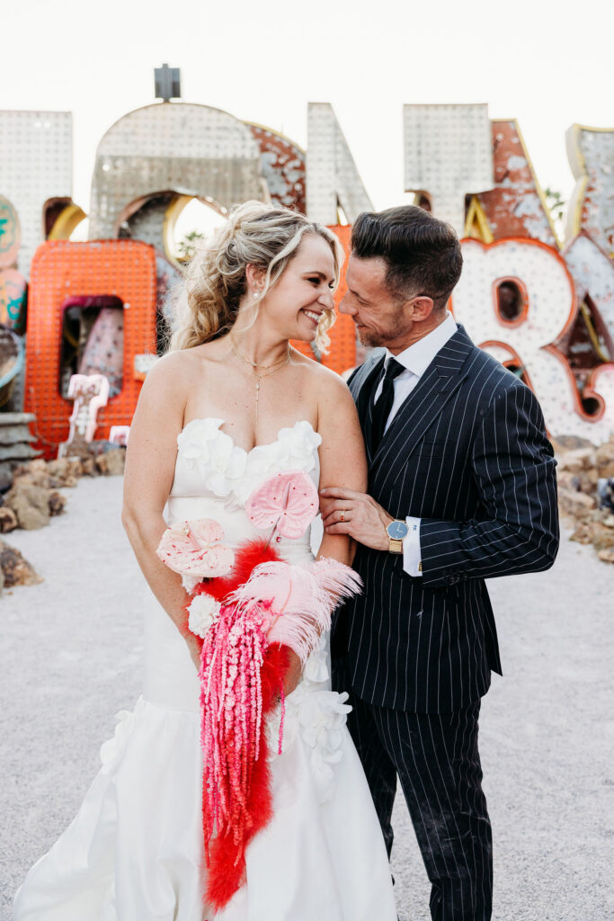 cute picture of the newlyweds smiling at each other