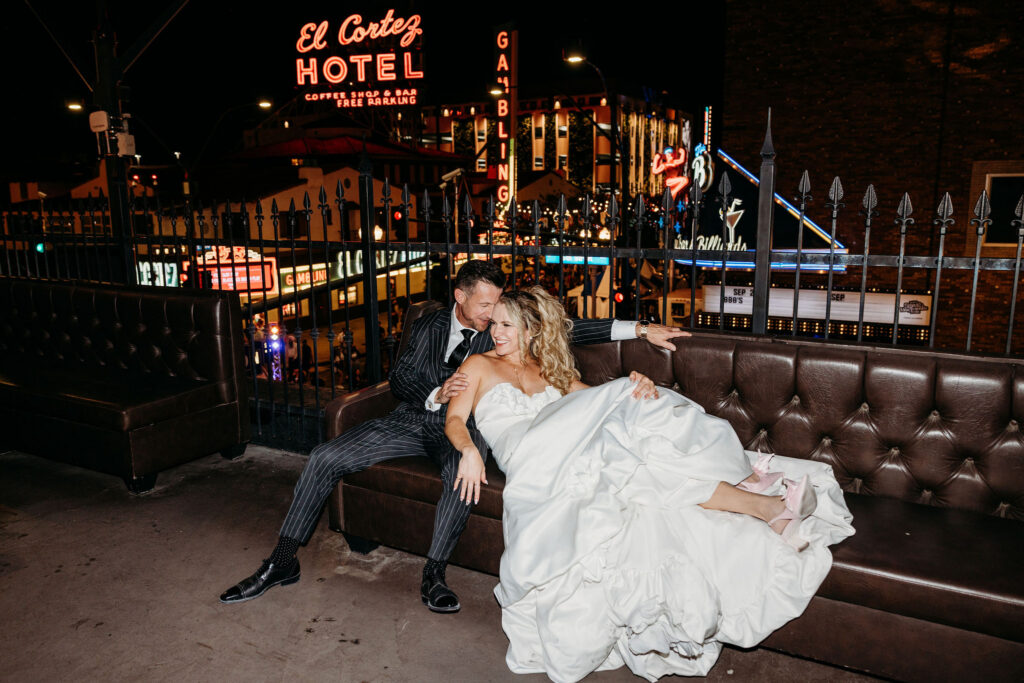 groom kissing the bride on the forehead