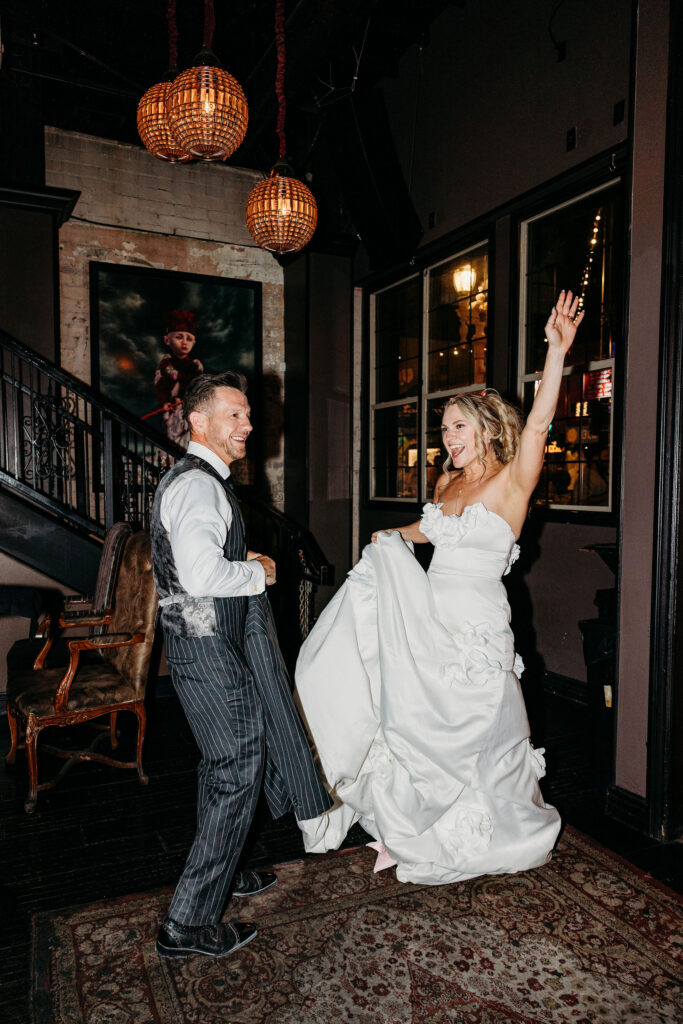 newlyweds dancing at their wedding reception