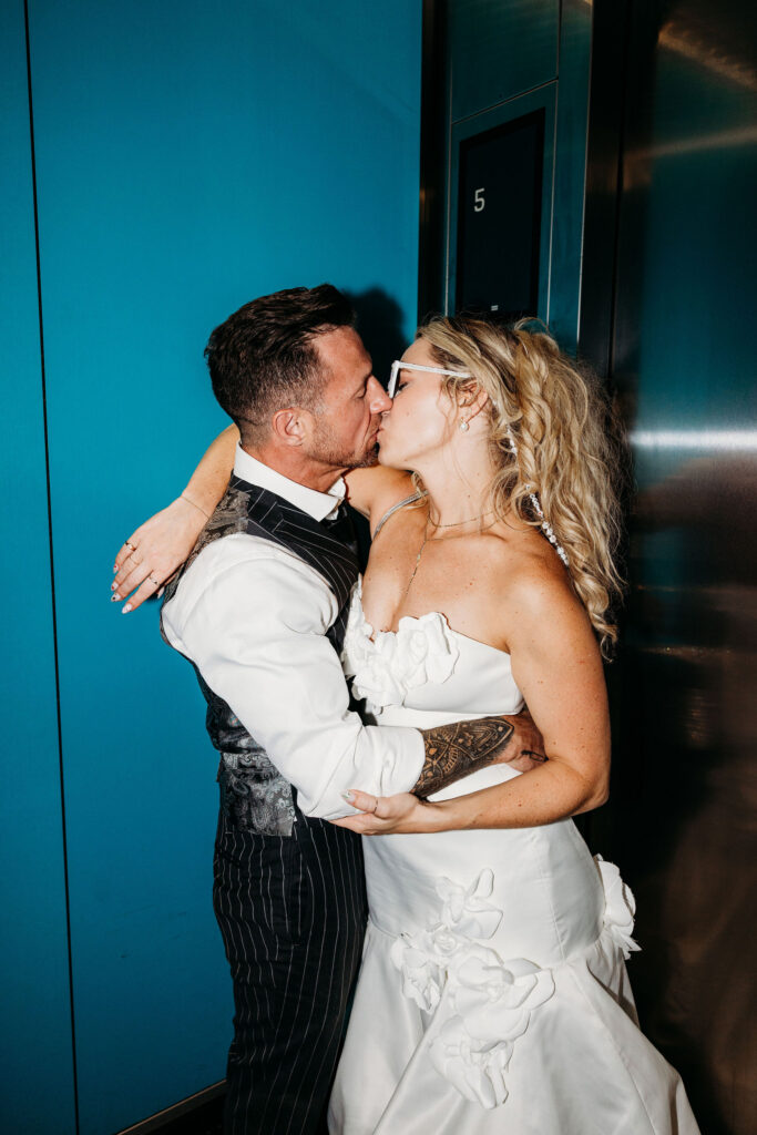 cute portrait of the newlyweds kissing