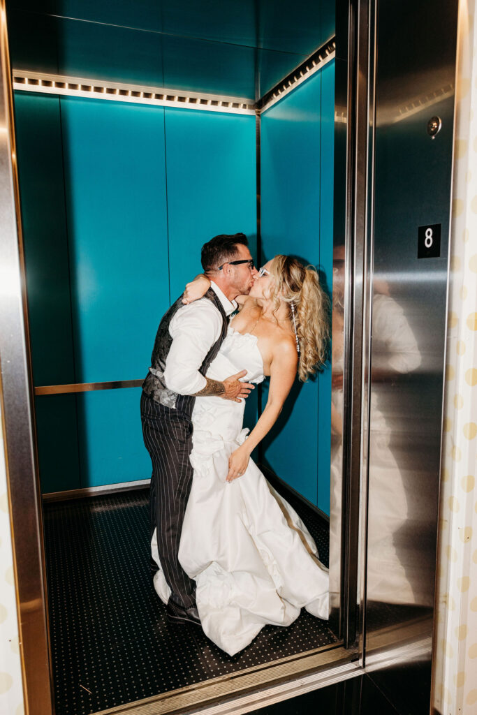 cute picture of the newly married couple kissing