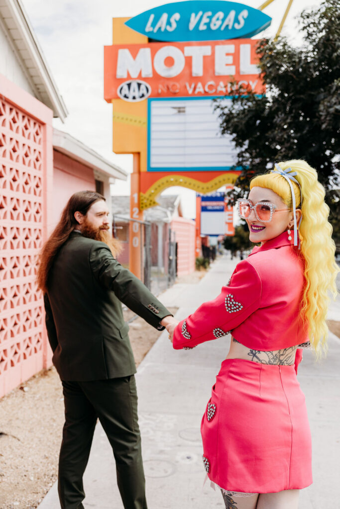 cute picture of the bride and groom holding hands