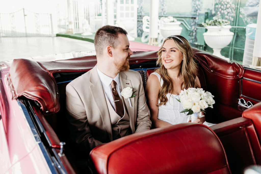 bride and groom smiling at each during their ceremony