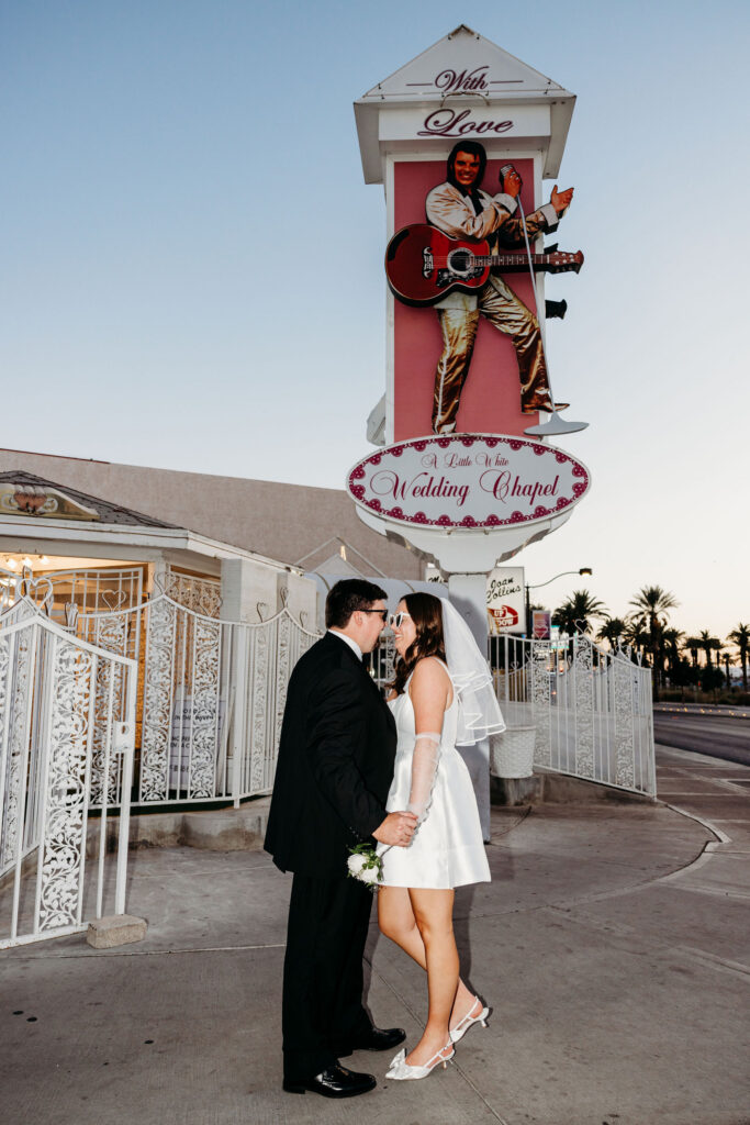 cute picture of the newlyweds kissing