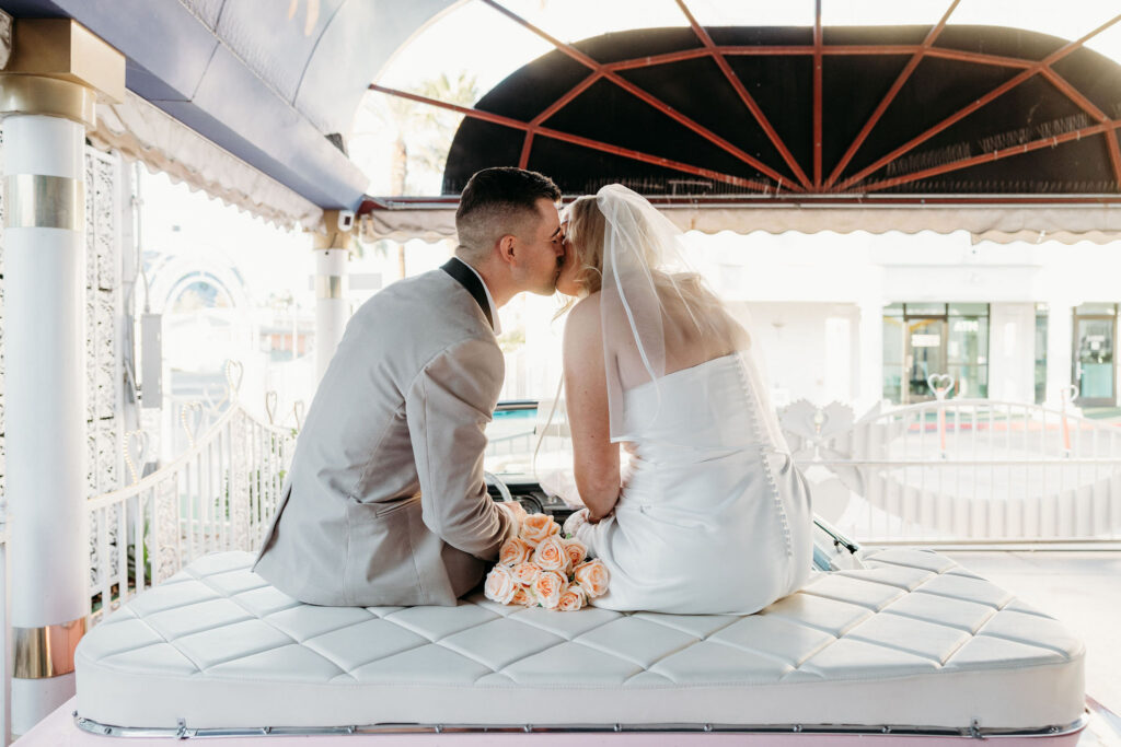cute picture of the newlyweds kissing