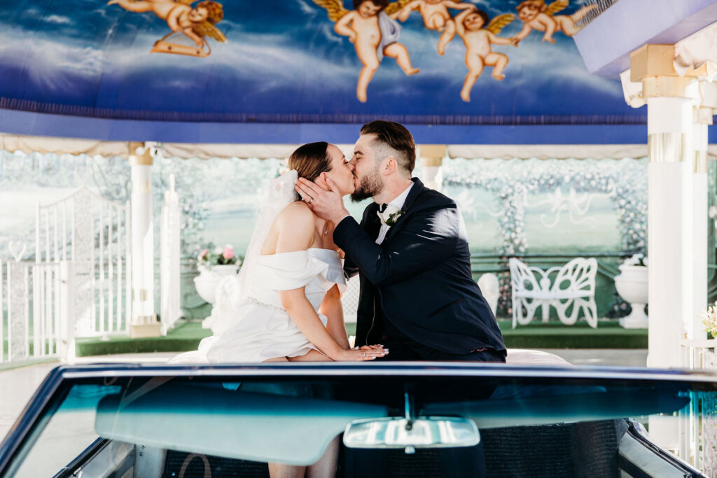 newlyweds kissing after their ceremony