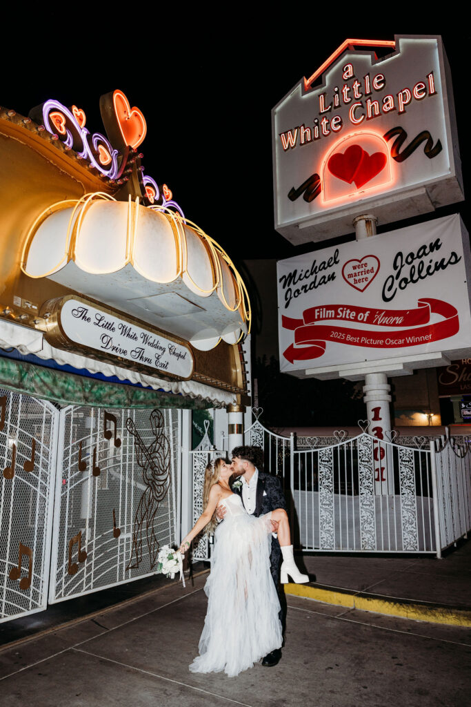 portrait of the newly married couple kissing