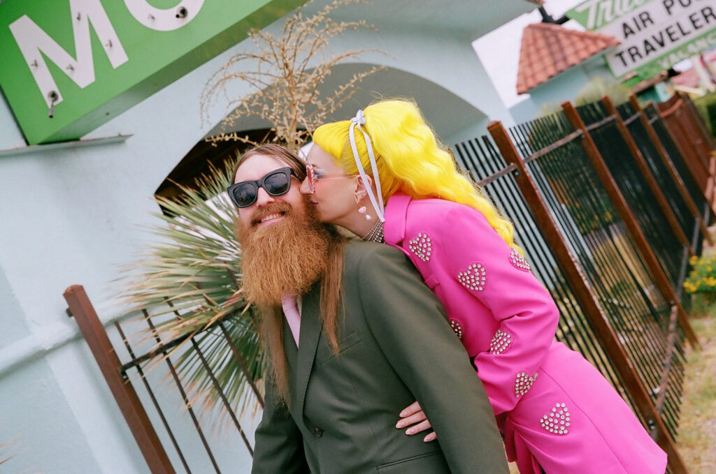 bride kissing the groom on the cheek