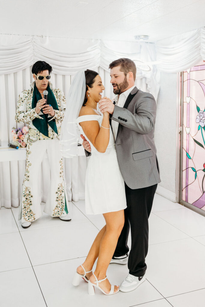 bride and groom dancing during their photoshoot