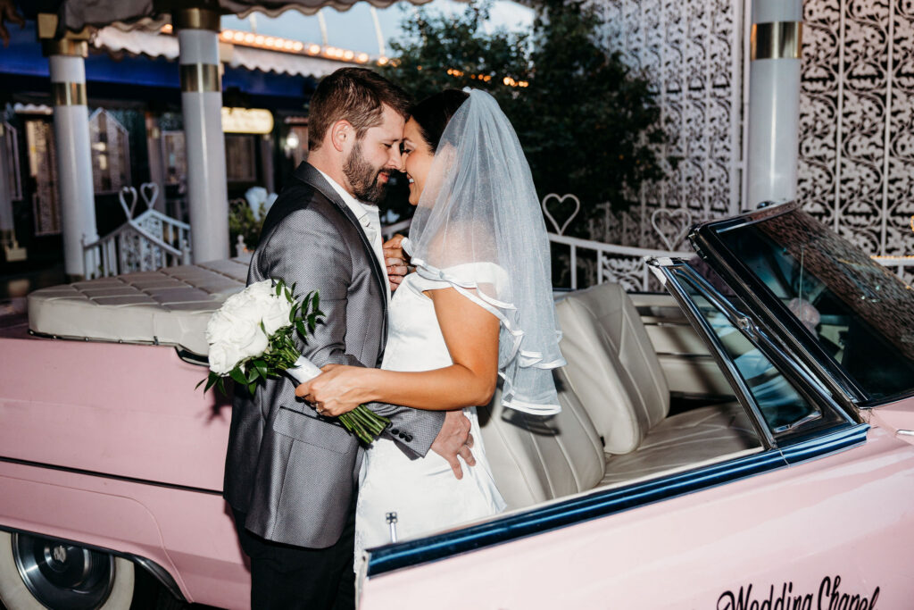 cute portrait of the newlyweds kissing