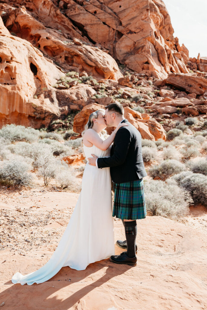 bride and groom kissing after their ceremony