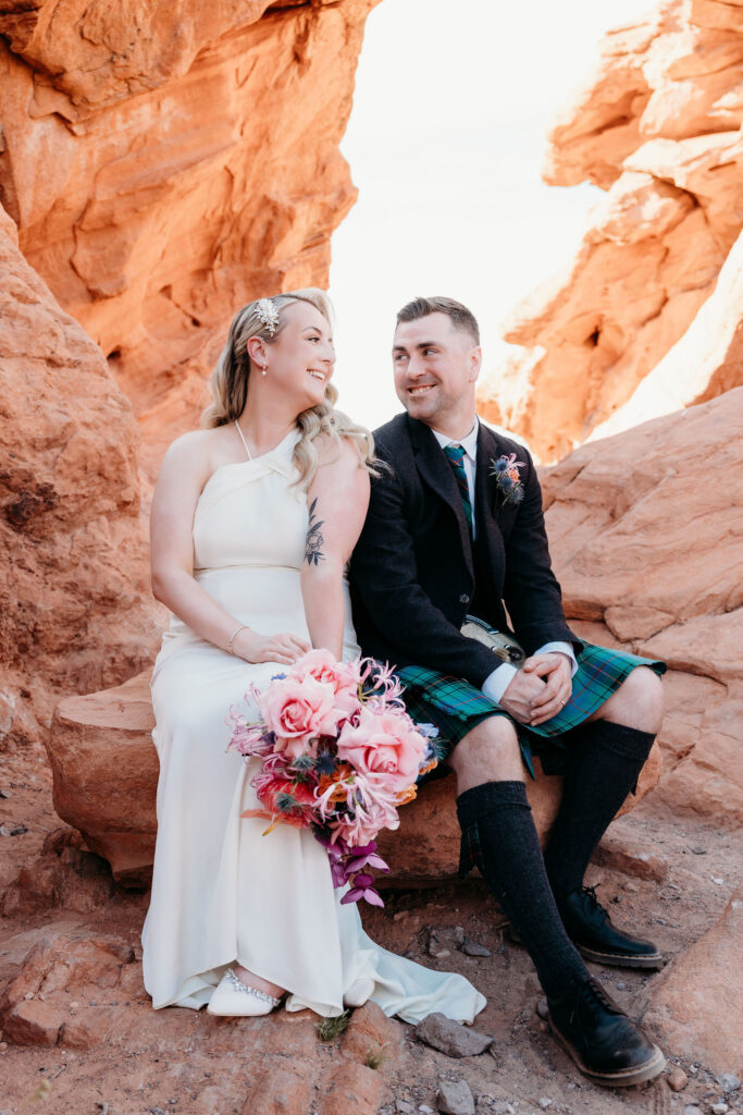 Portrait of the newly married couple, laughing with each other