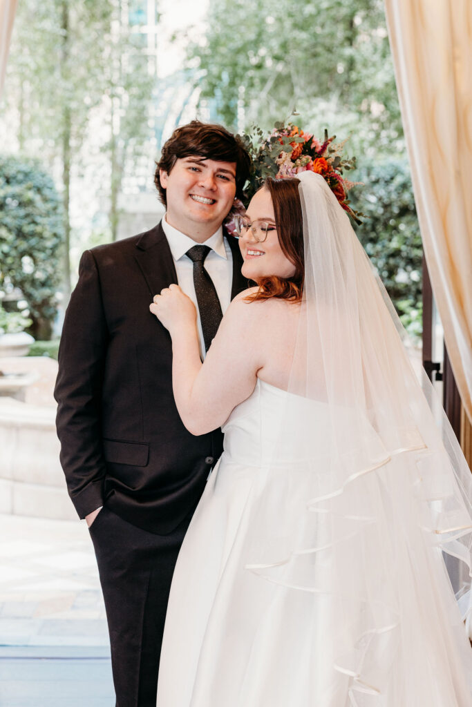 Cute picture of the newly married couple hugging