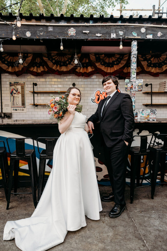 Cute picture of the newly married couple in downtown Fremont Street