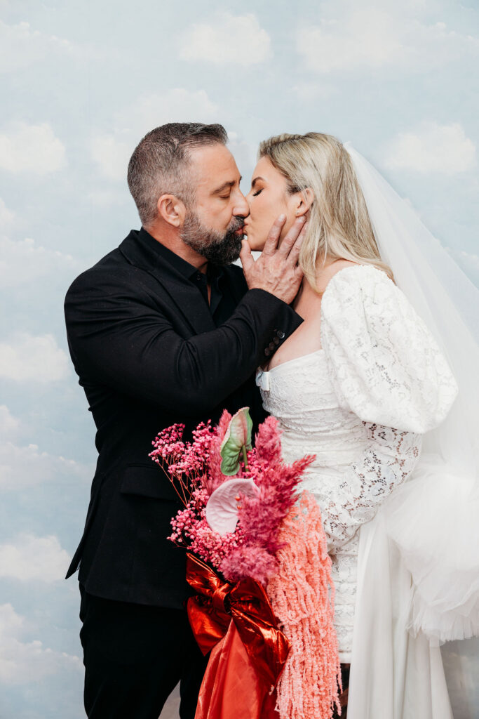 cute picture of the couple kissing during their vow renewal