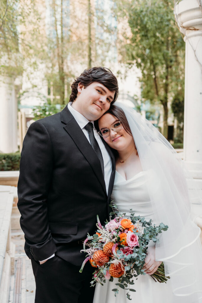 Cute picture of the newly married couple hugging