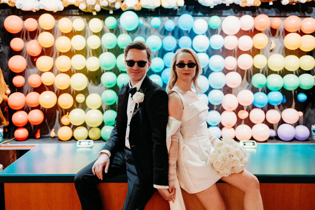 Bride and groom holding hands during their photo shoot