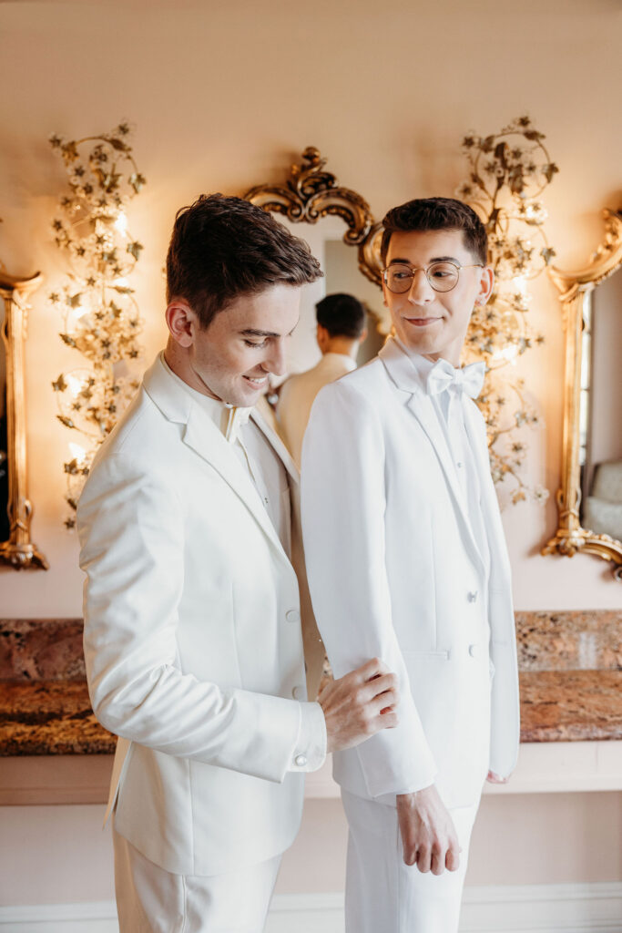 cute picture of the couple getting ready for their dream ceremony