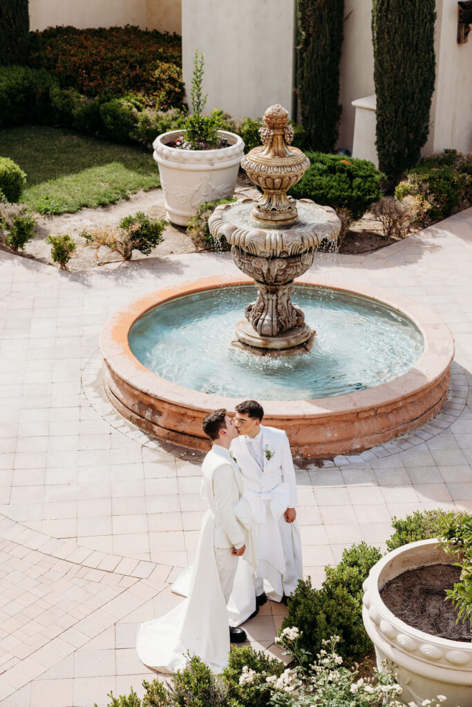 couple kissing during their bridal portraits