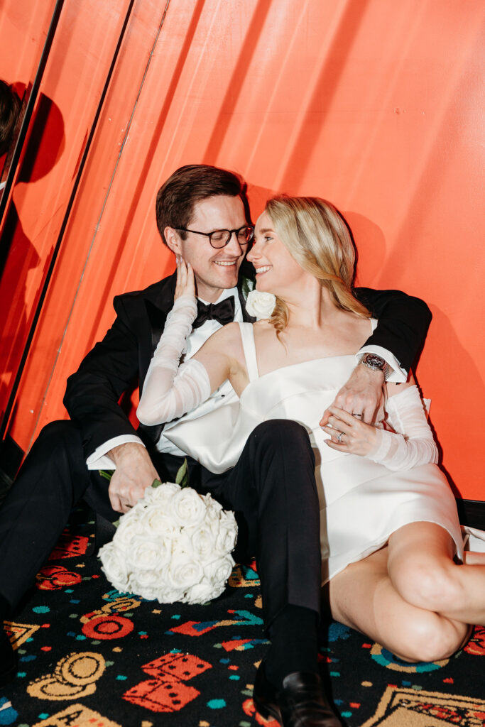 Picture of the bride and groom, smiling at each other