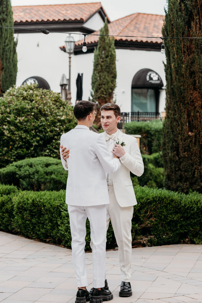 newlyweds at their first dance at their wedding reception