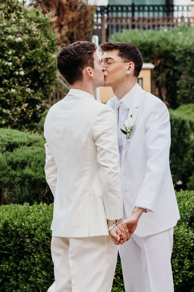 cute picture of the newlyweds kissing