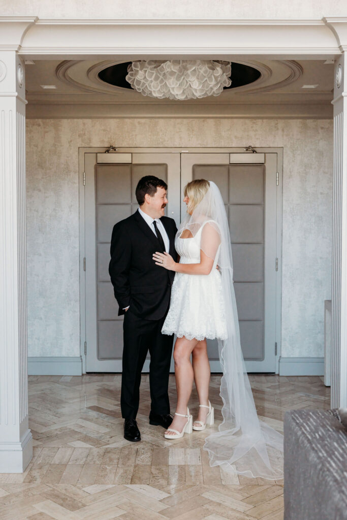 cute picture of the bride and groom smiling at each other