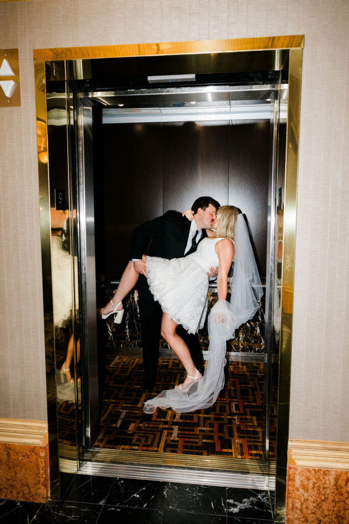 cute portrait of the bride and groom kissing