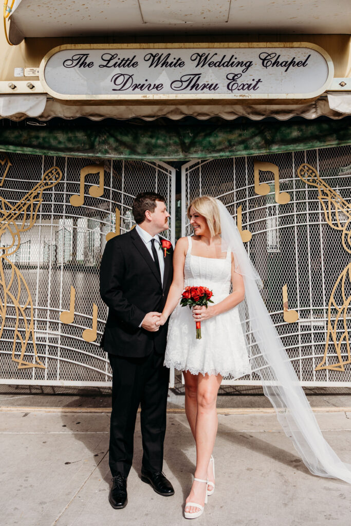 cute picture of the bride and groom smiling at each other